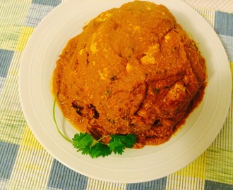 Gobhi Mussallam ( Whole cauliflower barbecued and served in a creamy onion-tomato sauce)
