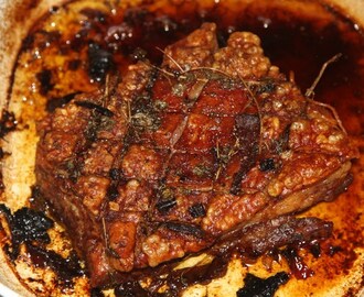 Slow-cooked pork belly with garlic and marjoram