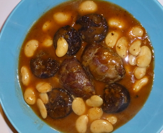 Delicious and Tender Braised Pork Cheeks in Cider with Black Pudding and Butter Beans Recipe