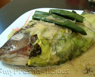 Sinanglay na Tilapia with Taro and Cabbage leaves
