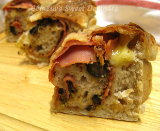 Tortano - Italian Bread with Ham, Cheese, And Olive Filling