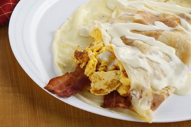 Breakfast Crepe with Egg Bacon and Cheese Sauce