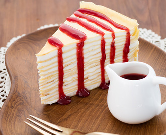 Crepe cake with berry sauce