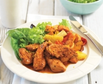 Portuguese chicken tenderloins on warm roasted vegetable salad