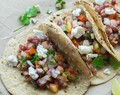Mexican bean tacos with tomato-onion salsa
