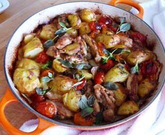 Crispy chicken thighs, roasted tomatoes and crushed new potatoes