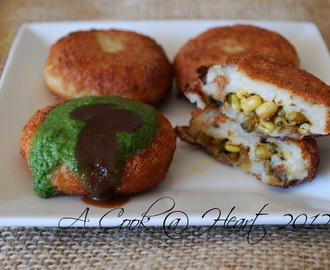 Aloo Tikki Chaat  (Stuffed Potato Shells)