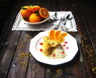 Pollo de corral a la naranja con perlas de pimientos y brotes