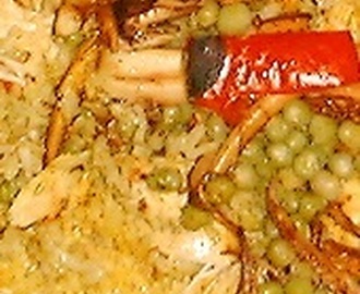 Paella van gebakken konijn en chorizo