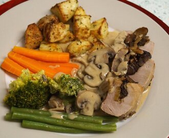 Pork tenderloin stuffed with sherry soaked prunes and chestnuts, in a mushroom cream sauce.