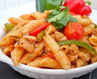 Sautéed Chicken Penne With Crunchy Peppers and Cherry Tomatoes..
