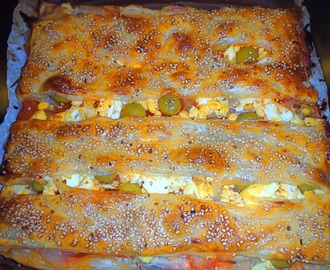 Empanada de pasta de full amb sardines  - Empanada de hojaldre con sardinas