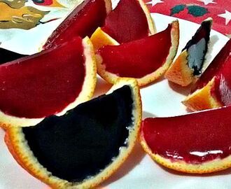 Gajos de colores de gelatina de naranja