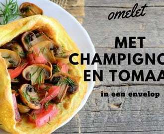 Gevulde omelet met tomaat en champignons