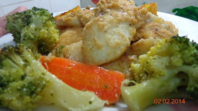 Ψάρι Πανγκάσιους με πατάτες πορτοκάλι κ.τ.λ στο φούρνο !!