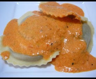 Ravioli with Roasted Red Pepper Cream Sauce