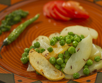 Zeera Aloo Matar : Cumin tempered pan fried potatoes and peas
