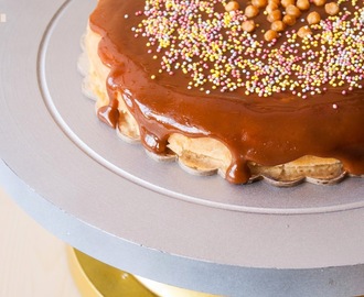 Eggless Butterscotch Cake topped with Butterscotch Sauce
