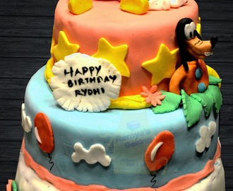 A Mickey Mouse Club house themed cake for my little princess