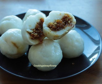 Sweet kozhukatta / steamed rice dumpling with coconut and jaggery filling.