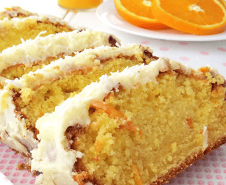 Μυρωδάτο κέικ πορτοκαλιού καλυμμένο με κρέμα πορτοκαλιού, από το sintayes.gr!