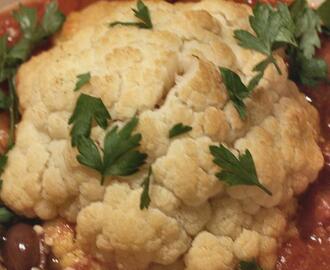 Whole Baked Cauliflower With Tomato and Olive Sauce