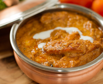 Paneer Butter Masala – cottage cheese cooked in rich tomato gravy.