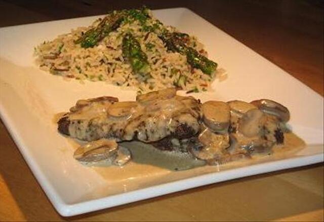 Ostrich Steaks With Mushroom Vanilla Sauce and Wild Rice With As