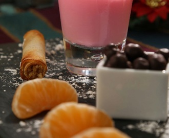 Cuajada de anís, rollo de nueces y miel, chocolate y fruta fresca (Postre de Navidad)