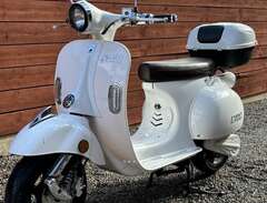 Evolt Sakura El-moped