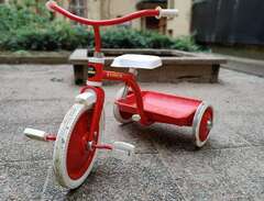 röd Crescent bambo trehjuling