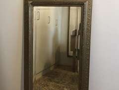 Stor antik spegel med guldram