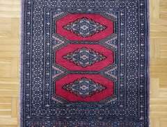 Persisk handknuten matta i ull