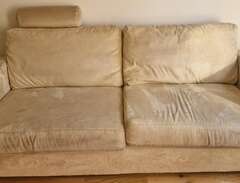 Beige soffa skänkes