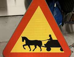 Varningsskylt häst och vagn