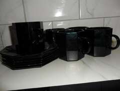 Svarta kaffekoppar