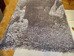 Bortskänkes - grå matta